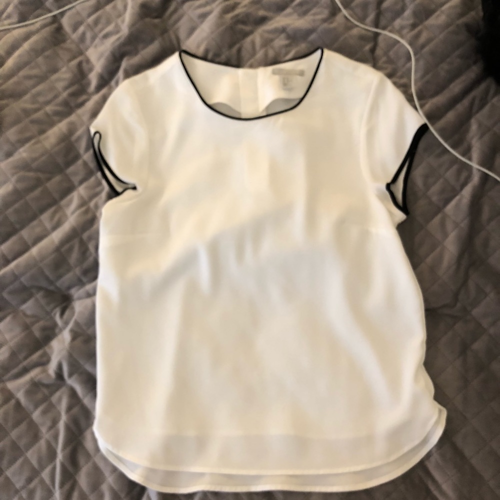 White blouse with black trim